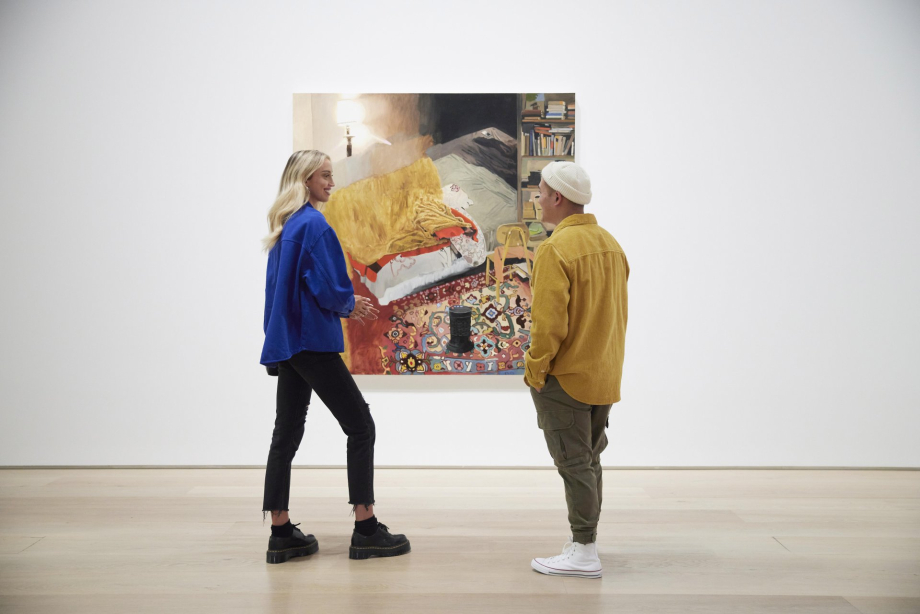 two people talking in front of an artwork at the Esker Foundation