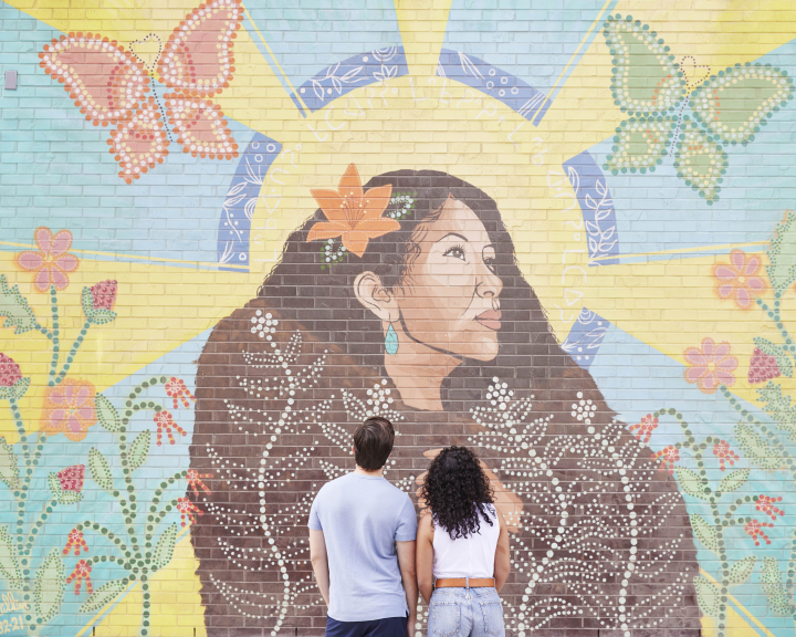 Couple admiring a public art installation in downtown Calgary