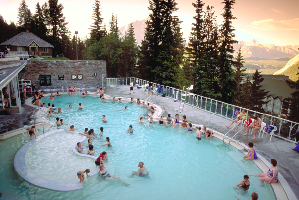 A crowd of people at Banff Upper Hot Springs in Banff National Park