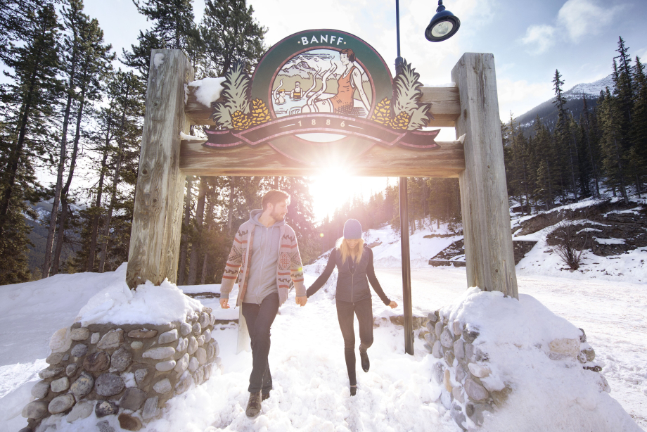 Couple walking though the entrance at the Banff Upper Hot Springs