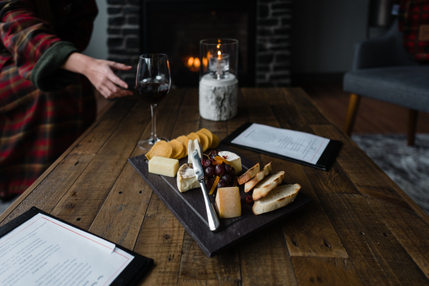A top down photo of a charcuterie board from the Bistro at the Nordic Spa at the Pomeroy Kananaskis Mountain Lodge