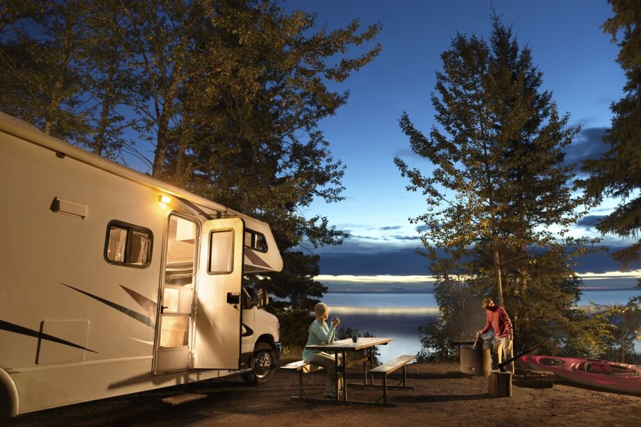 Older couple camping in an RV at Cold Lake in Northern Alberta