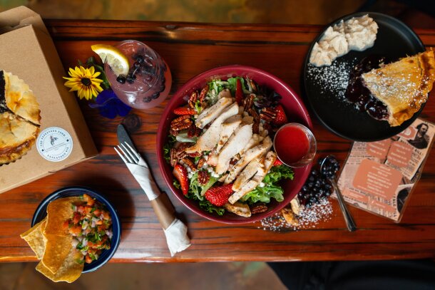 A table set with various dishes at The Saskatoon Farm.