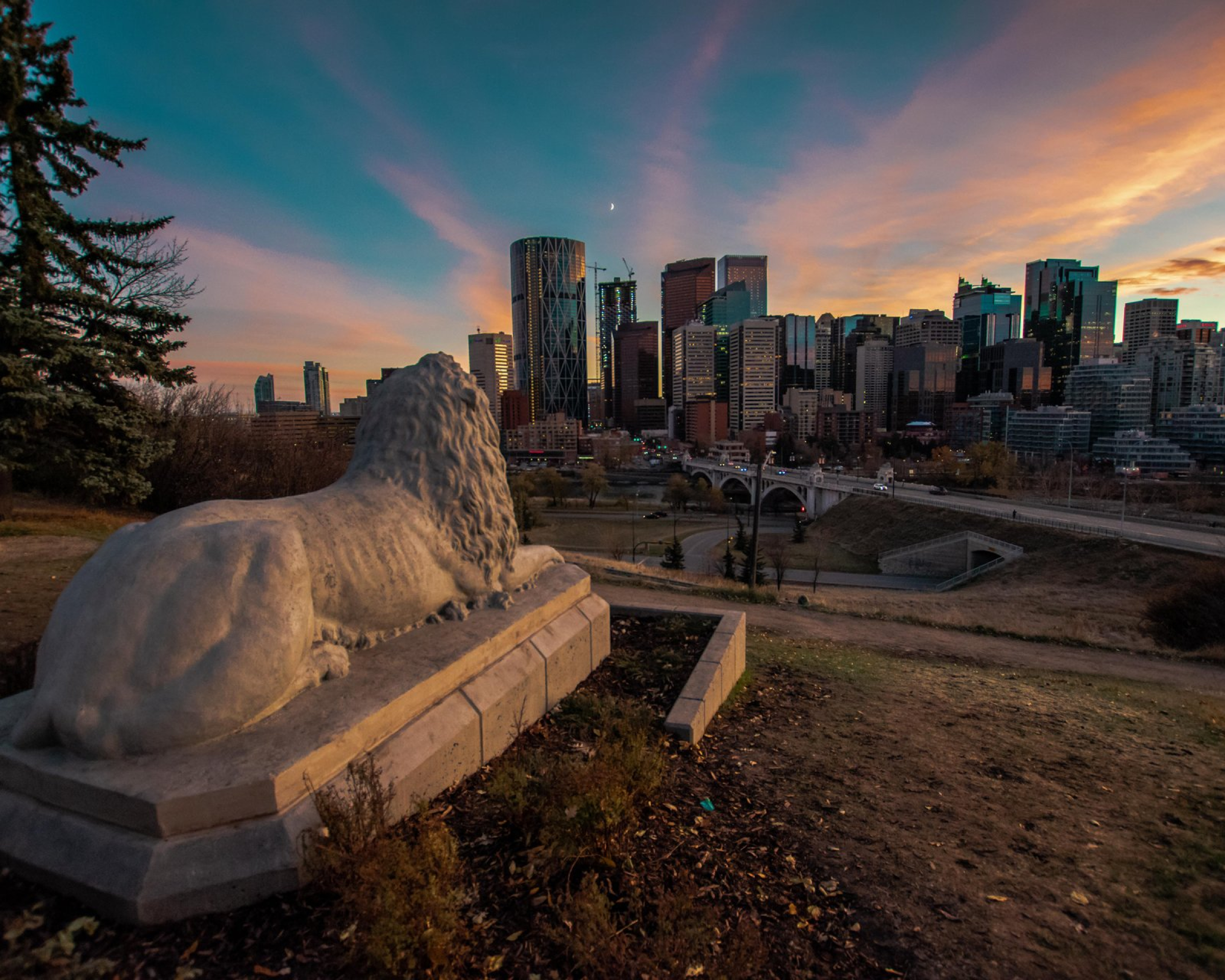 Centre Street Lion overlooking Calgary Skyline