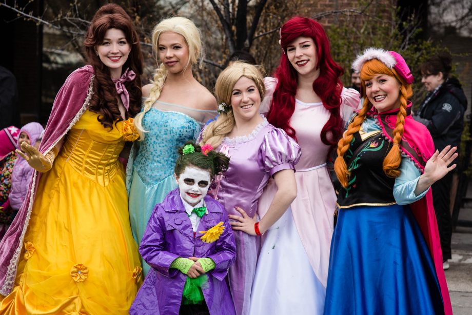 Family poses for photo in costume.