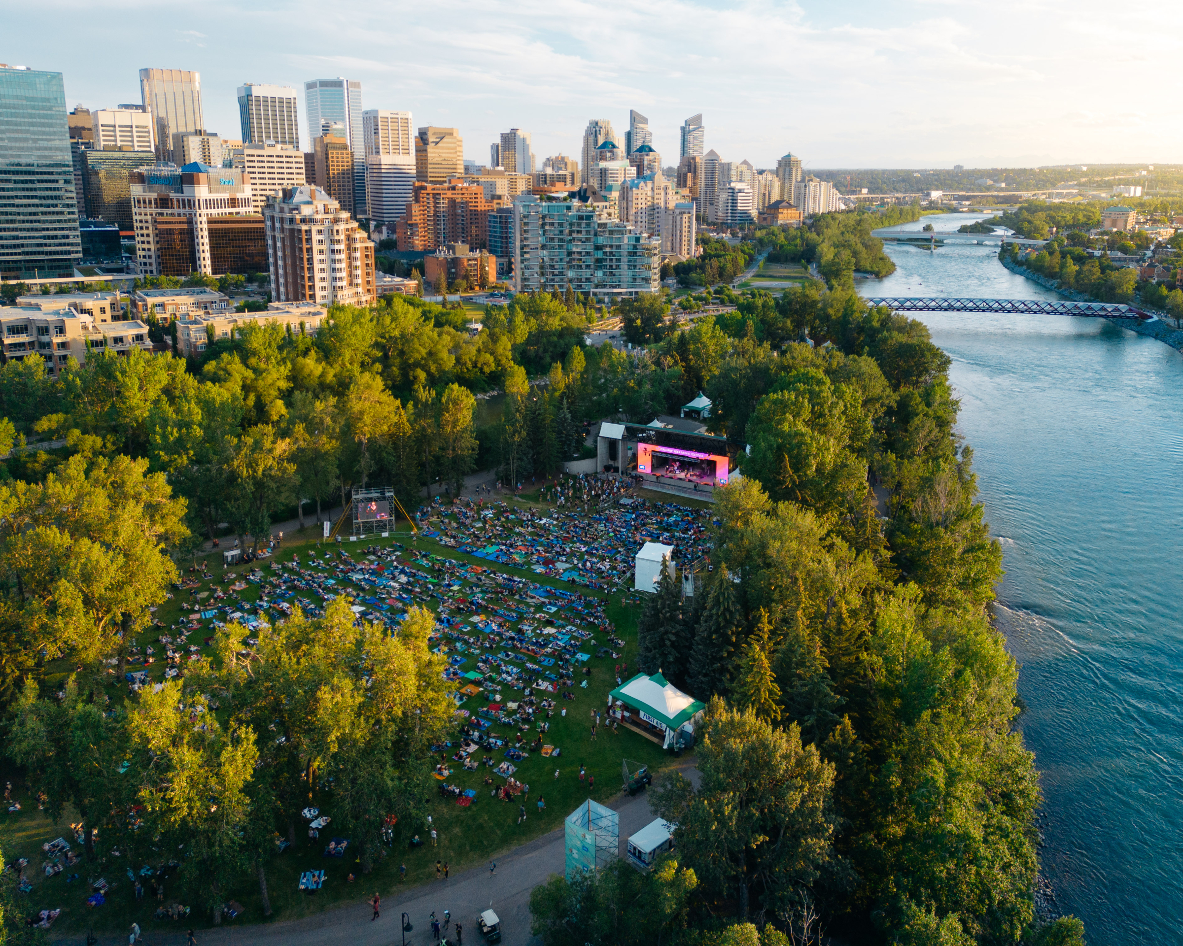 Aerial shot of Calgary Folk Music festival crowd and the bow river