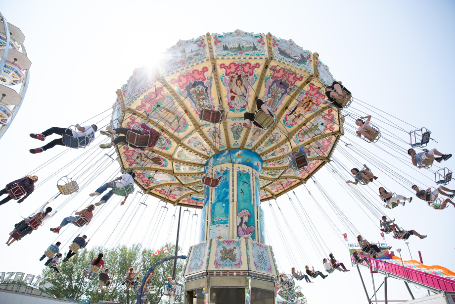 worm eye view of the ferris wheel swings at the calgary stampde