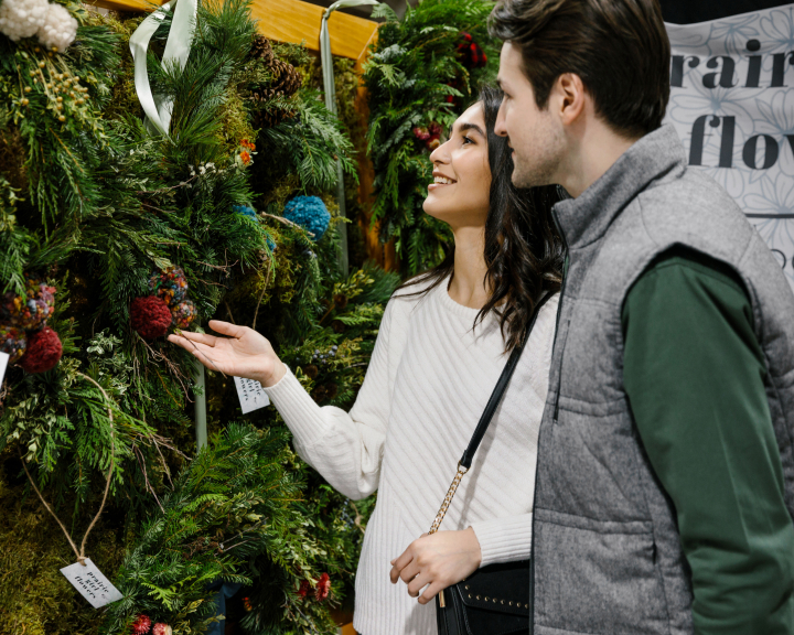 Couple shopping at a Christmas market