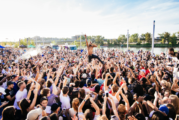 Concert along the bow river with large crowd