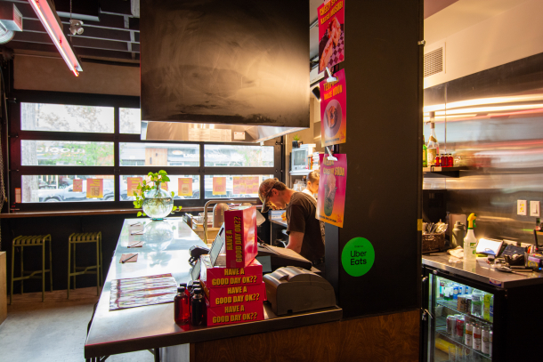 The bar and kitchen at First Avenue Corner Store