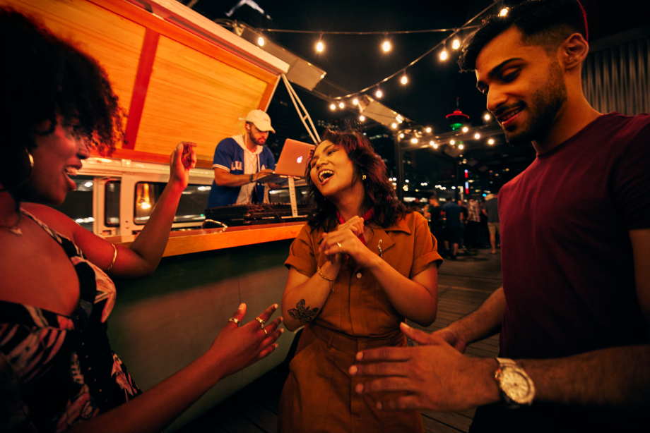 People enjoying CRAFT rooftop patio downtown Calgary