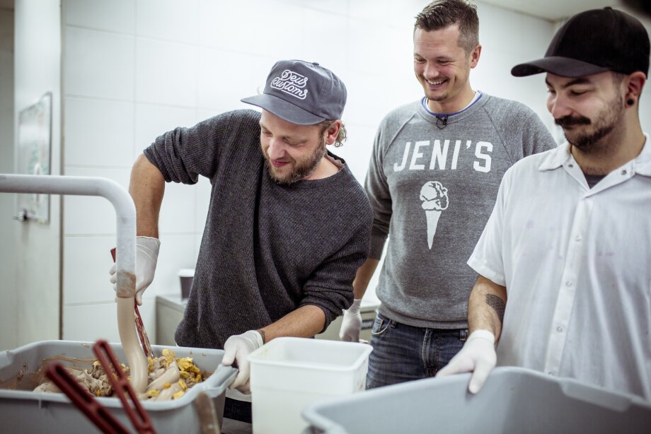 Three employees making ice cream at Made by Marcus.
