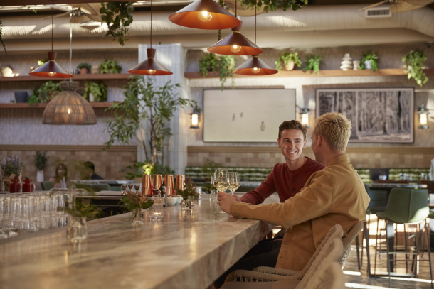 couple seated at the bar at Porch