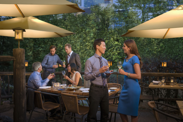 Evening wine and cocktail reception on patio at River Cafe restaurant in Prince's Island Park in Calgary