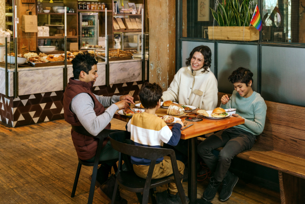 A family enjoys treats and drinks at the Sidewalk Citizen Bakery in Calgary
