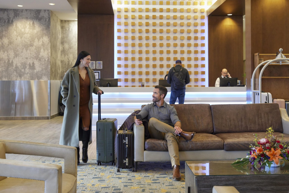 two people in the lobby on Grey Eagle Resort & Casino