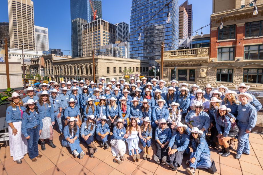 Tourism Calgary Staff picture at dressed in cowboy attire.