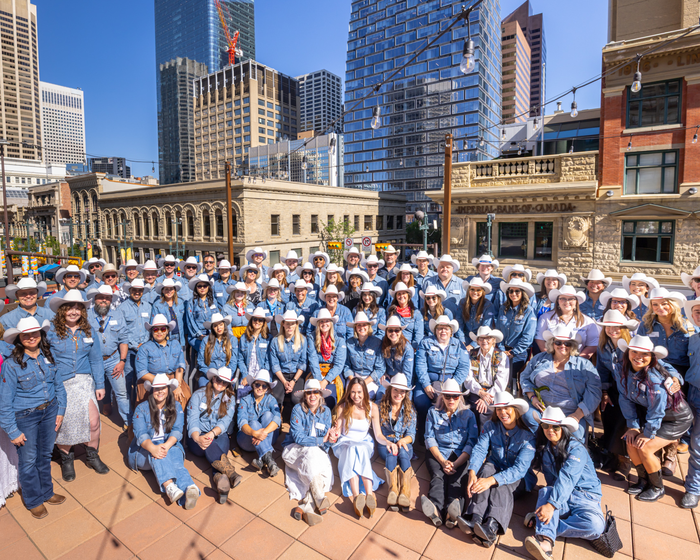 Tourism Calgary Staff picture at dressed in cowboy attire.