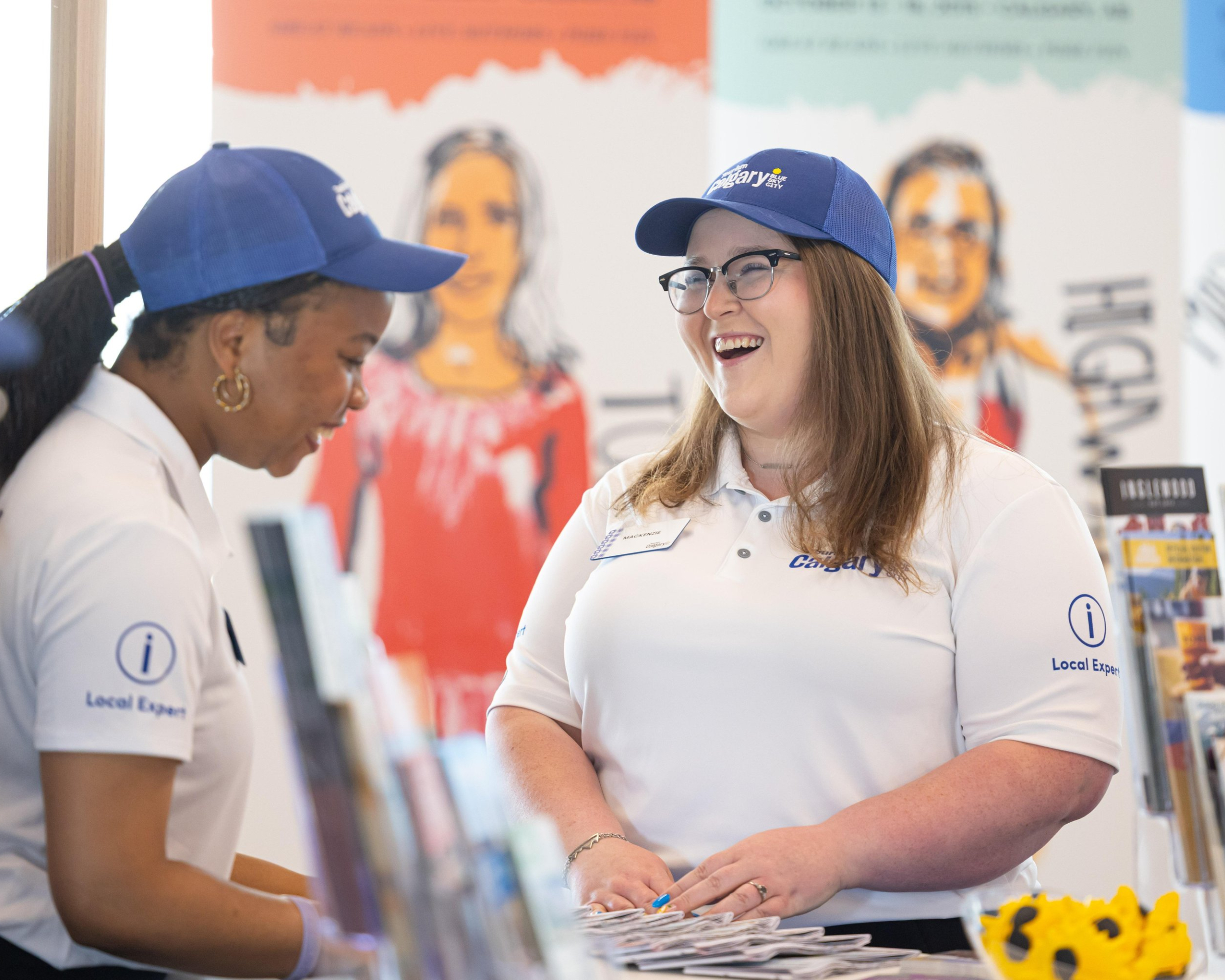 Two female visitor services staff members
