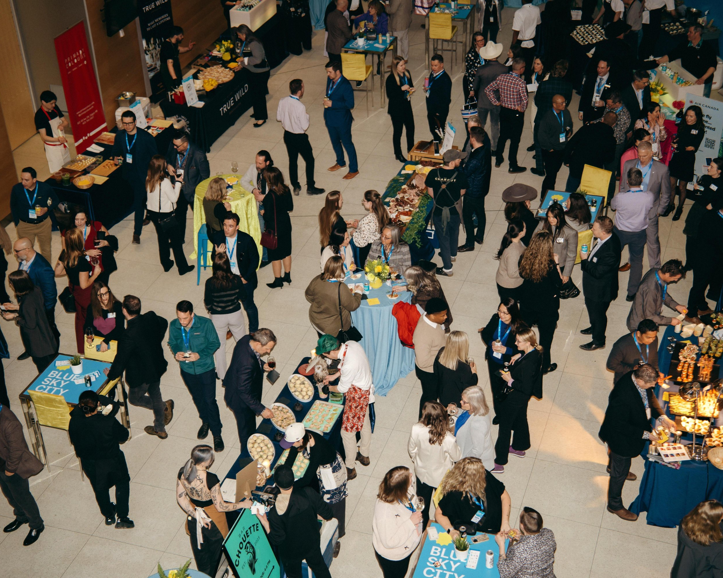 Crowd of industry colleagues at Tourism Calgary's Town Hall social event