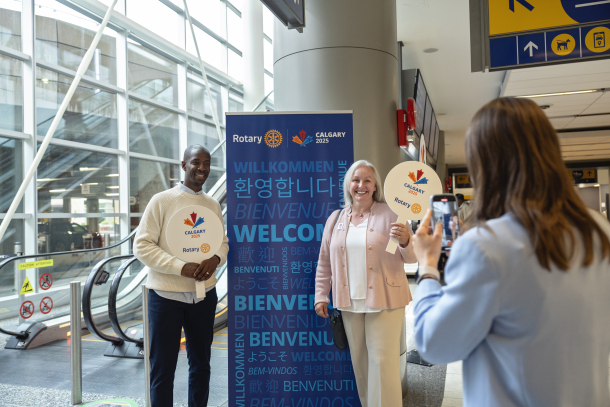 Greeters were ready to welcome attendees from around the world at the Calgary International Airport