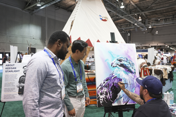 Indigenous artist, Keegan Starlight, did a painting demonstration on the conference floor