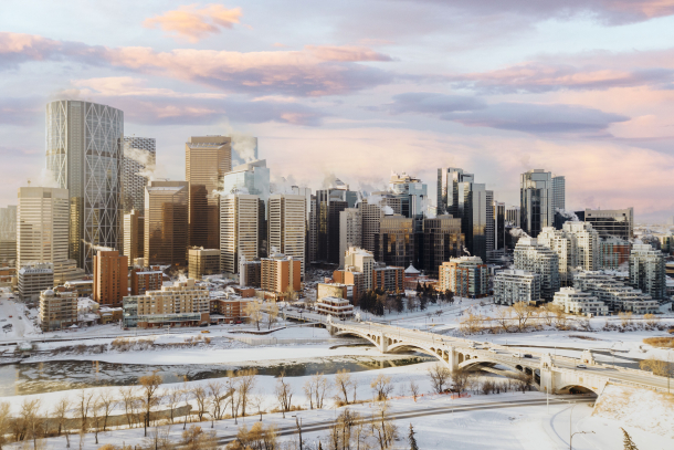 downtown Calgary skyline during a winter cotton-candy sunrise from s Rotary Park viewpoint