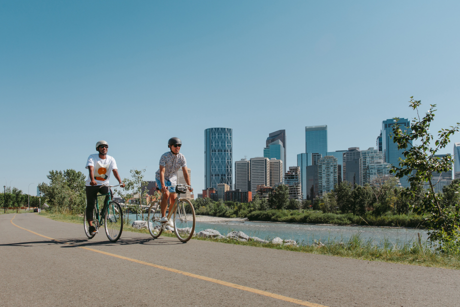 Two cyclists enjoying a bike ride along Memorial Drive in downtown Calgary.