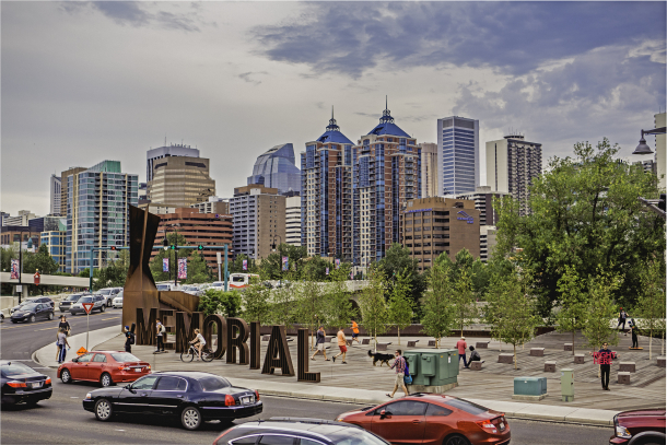 Street view of Poppy Plaza and high-rise buildings in downtown Calgary