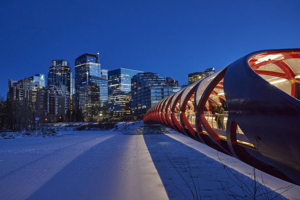The Peace Bridge in Calgary over the frozen Bow River during Winter