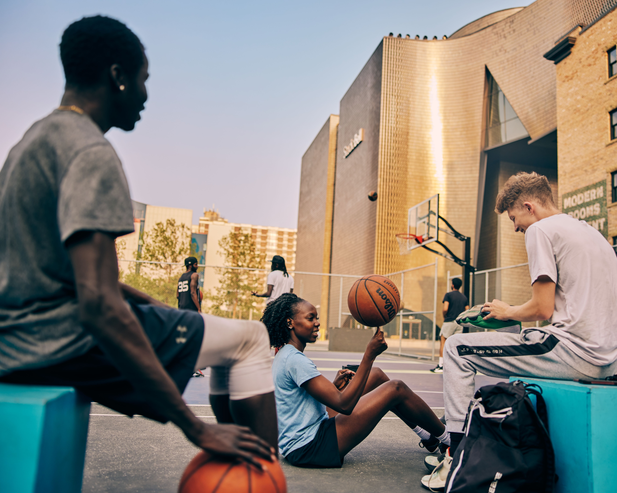 People playing basketball at The Bounce in the East Village in Calgary