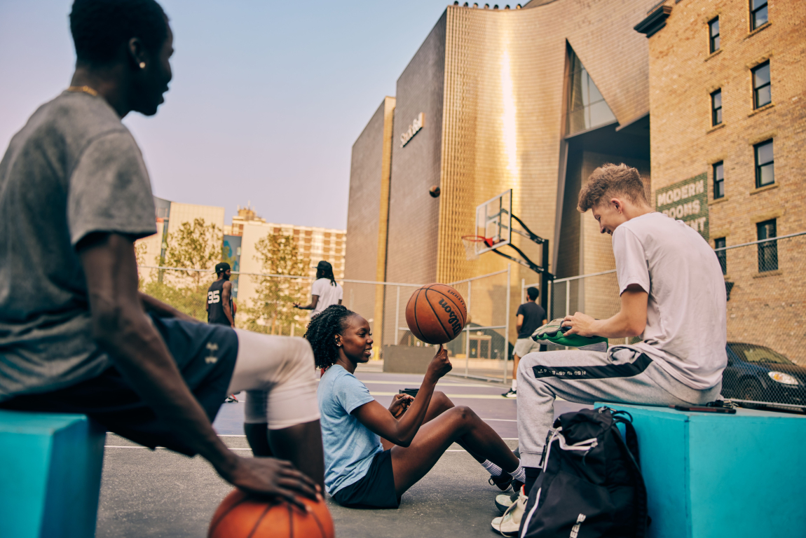People playing basketball at The Bounce in the East Village in Calgary