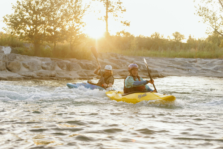 Two people kayaking at Harvie Passage in Calgary