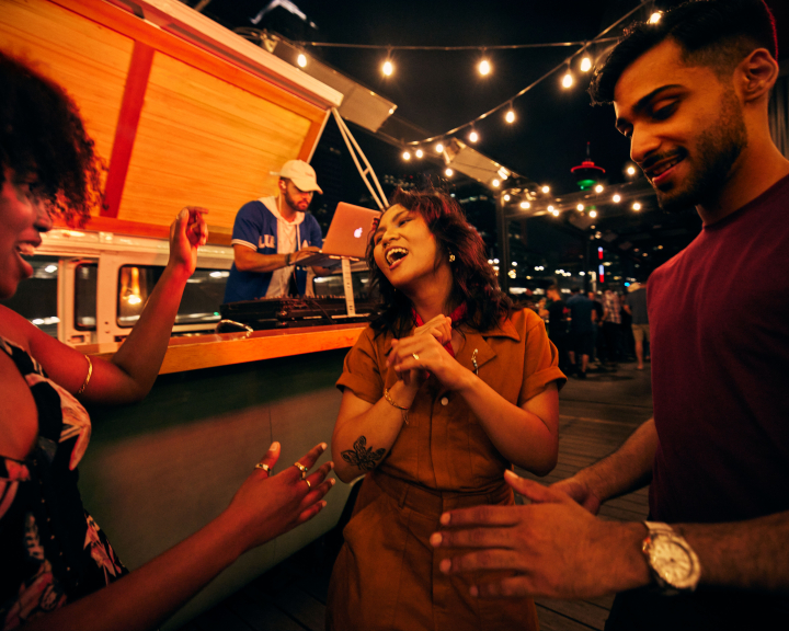 People enjoying CRAFT rooftop patio downtown Calgary