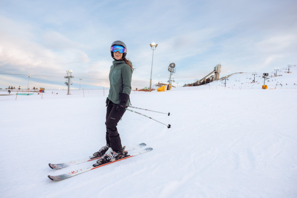 woman downhill skiing at WinSport in Calgary