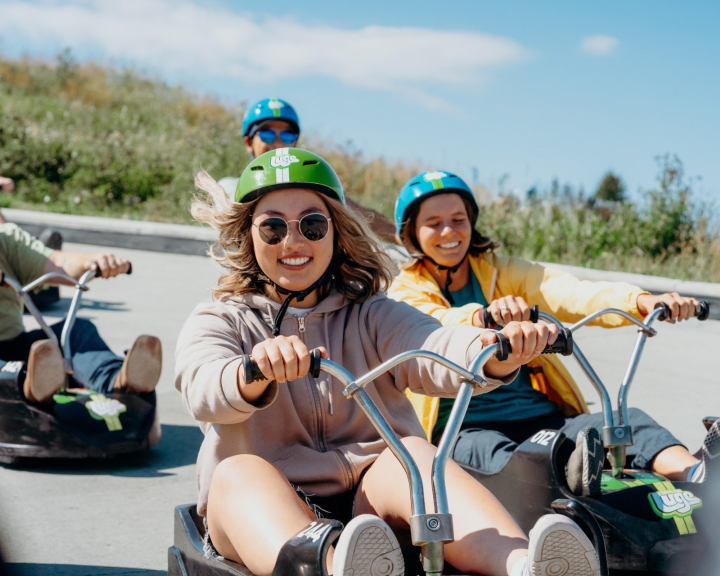 group of friends enjoying Downhill karting during summer