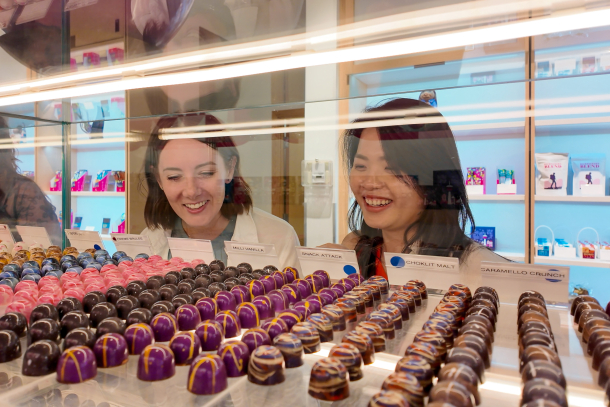 Two women looking at chocolate at Chocolate Lab.