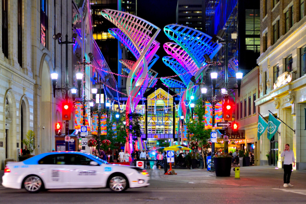 Galleria Tree arch sculpture at night on Stephen Ave
