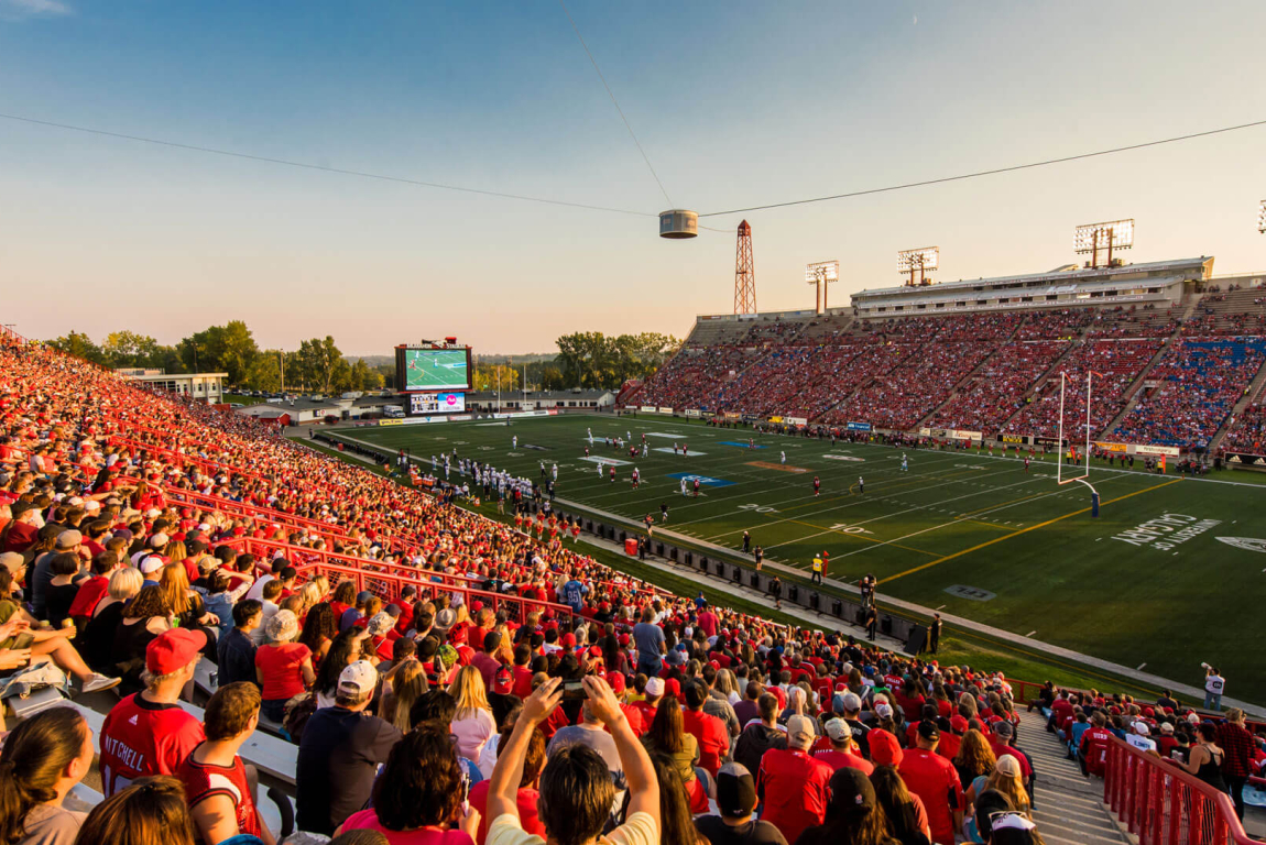 Fans cheering at a Calgary Stampeders game