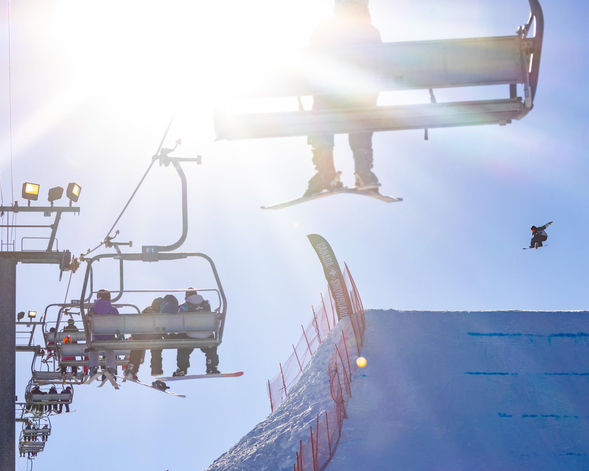 Skier riding a chairlift