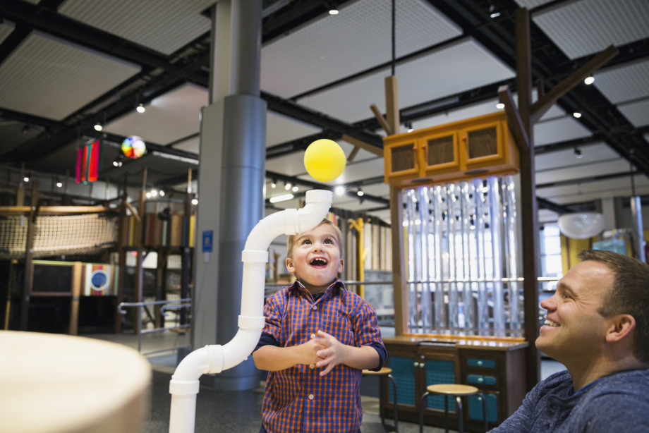 A father and son enjoying the Creative Kids Museum at Telus Spark Science Centre in Calgary