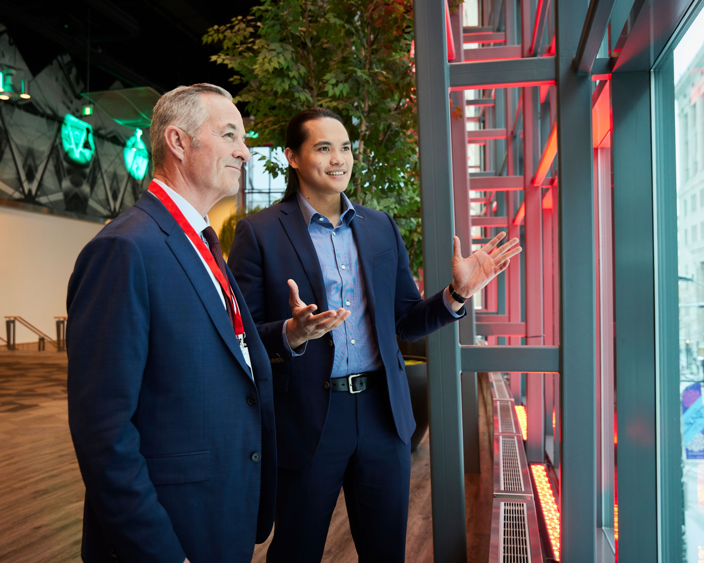 Two men chatting at the CTCC