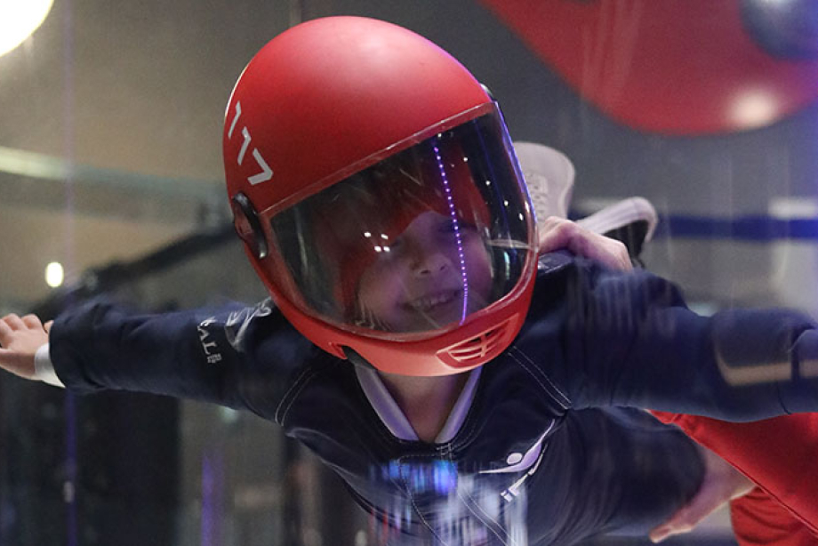 a kid experiencing skydiving at ifly calgary
