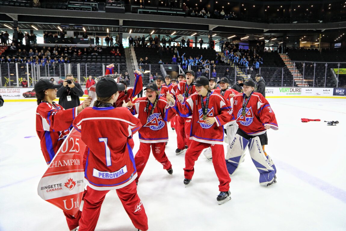 The U16AA Calgary Riot celebrate after winning the 2025 U16 National Championship. AA Ringette Calgary had fi ve teams compete in the 2025 Canadian Ringette Championships across two divisions